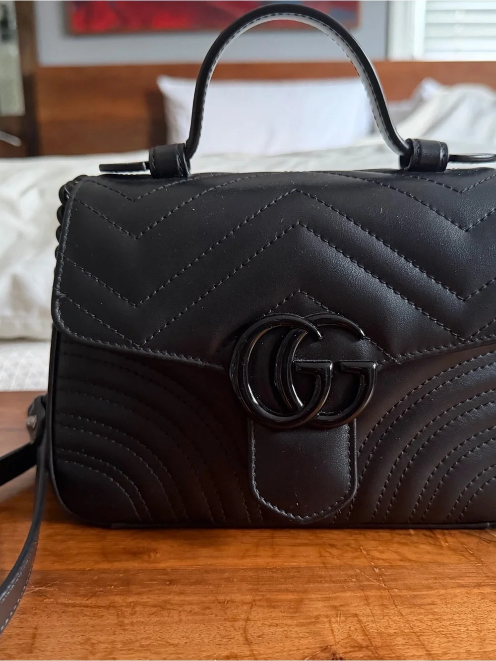 GG Marmont Mini Black Quilted Top-Handle Women’s Bag with Interlocking Logo
